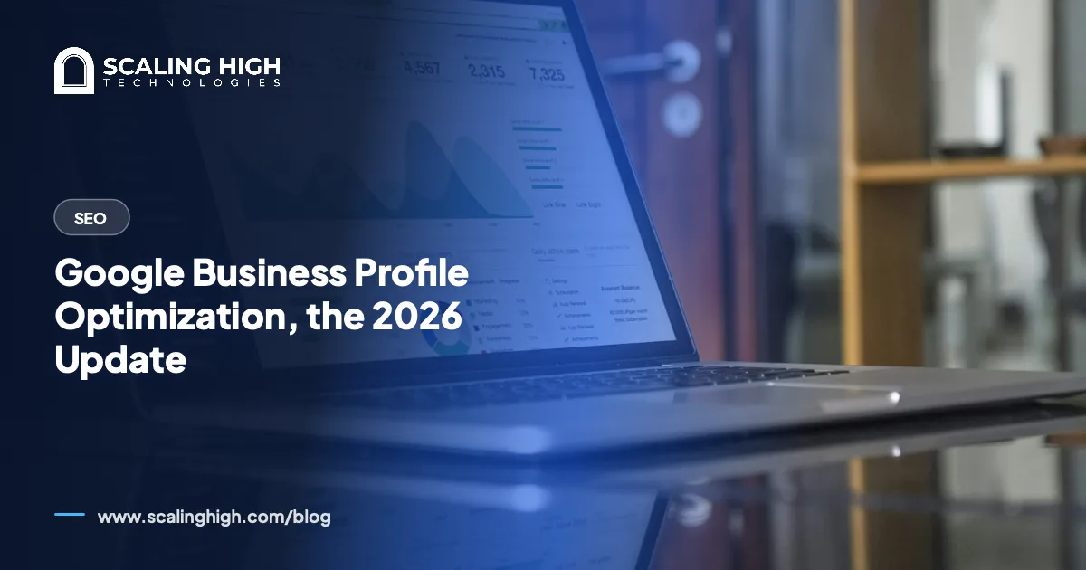 Laptop open on a desk showing a business analytics dashboard with charts and account metrics